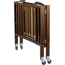 Load image into Gallery viewer, Full-Size Folding Crib - SnuggleBug Baby Gear
